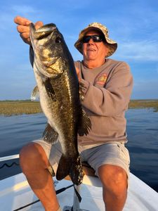 Fisherman holding a 33-inch fish in FL