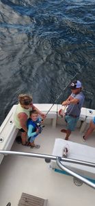 Three people fishing at the beach in Gulf Shores