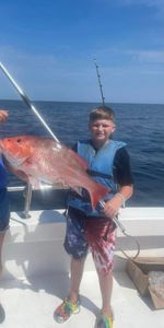 Two people fishing in Gulf Shores