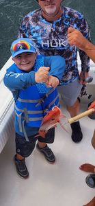 One person fishing in the waters of Gulf Shores