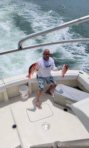 Angler fishing in Alabama with one fish