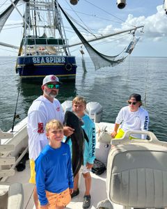 A group of 4 people fishing in Alabama