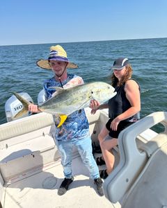 Two anglers with a big 21-inch fish on Dauphin Island