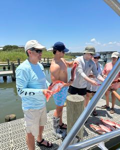 Two anglers fishing at Dauphin Island