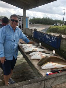 A person fishing in TX