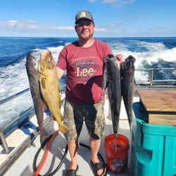 Fisherman with two fish in Rye