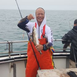 Lone angler fishing in Rye