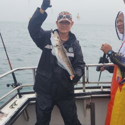 A pair of anglers with a catch in Rye