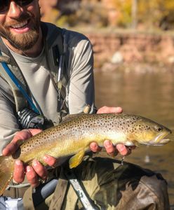 Photograph of a 23-inch sea trout caught while fishing in Dubois