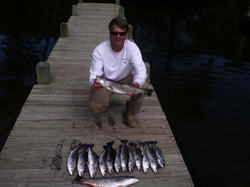 Angler holding a 16-inch fish in NC