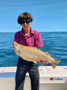 An angler with a rainbow trout in Henderson