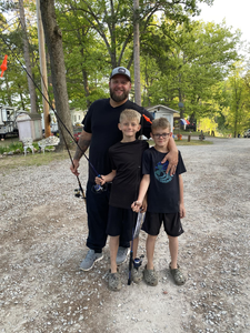 3 people enjoying fishing and tour activities in MI