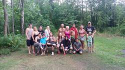 Group of 15 people enjoying fishing tours in MI