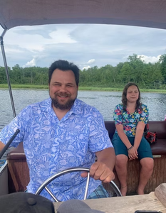Two people enjoying a fishing tour in Hale