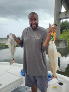 Two fish caught at North Topsail Beach during a fishing trip