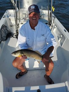 Angler with a redfish in NC