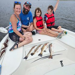 Three redfish caught on fishing trip at North Topsail Beach