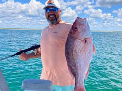 A lone Grey Snapper fish measuring 21 inches caught while fishing in Port St. Joe