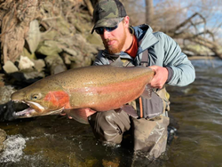 Image of a rainbow trout caught while fishing in Oswego