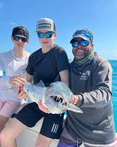 Three people enjoying Islamorada cruises and tours