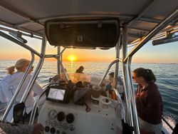 Three people enjoying a fishing trip in Islamorada