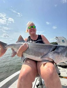A fisherman holding a 29-inch fish in Wagoner