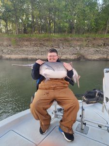 A person fishing in OK