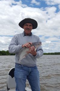 Person fishing at Wagoner location