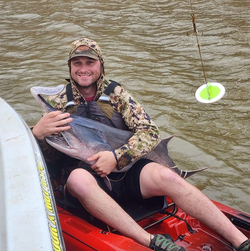 A person fishing in the OK area