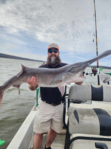 One fisherman with a large fish caught in Wagoner