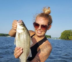 Fisherman catching a white bass in Wagoner
