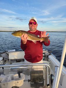 A person fishing in FL
