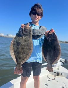 Two Summer Flounder and Southern Flounder caught while fishing in Jacksonville