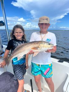 Redfish measuring 26 inches caught while fishing in FL