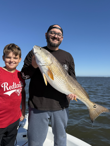 Great redfish action with deep sea light tackle as the weather cleared up!