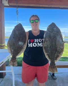 Two Southern Flounder and Summer Flounder caught in Jacksonville, Florida while fishing