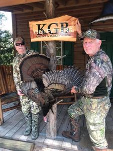 Two people enjoying a hunting adventure in FL