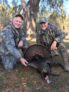 Two people enjoying a hunting trip in Williston