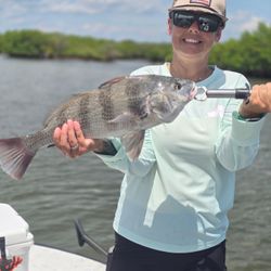 Angler with a black drum fish in Florida
