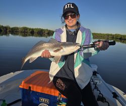 A person fishing in FL