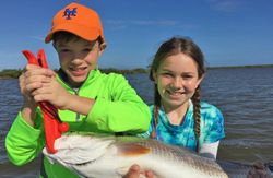 Two people fishing in New Smyrna Beach
