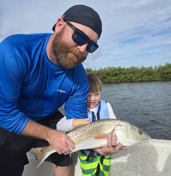 One person fishing with rod at New Smyrna Beach