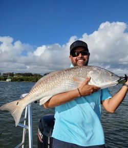 Angler with a Redfish in FL