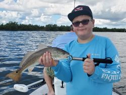 Caught a 15-inch redfish at New Smyrna Beach