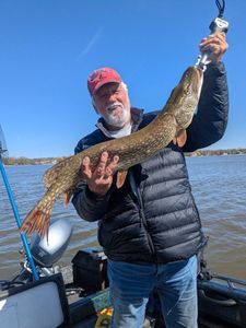 Angler with a fishing rod enjoying the outdoors in WI