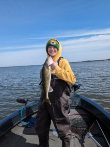 A lone angler fishing in the waters of Sturgeon Bay