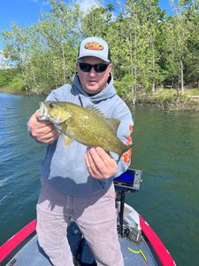 Angler holding 15-inch fish in Kimberling City