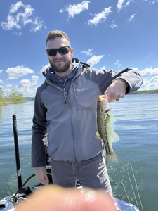 A big Largemouth Bass caught while jigging, casting heavy and light tackle at a prime fishing spot!