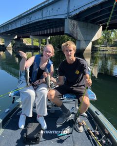 Two rainbow trout and chub mackerel being caught in MO