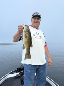 Landed a big Smallmouth Bass after a tough day on the water!